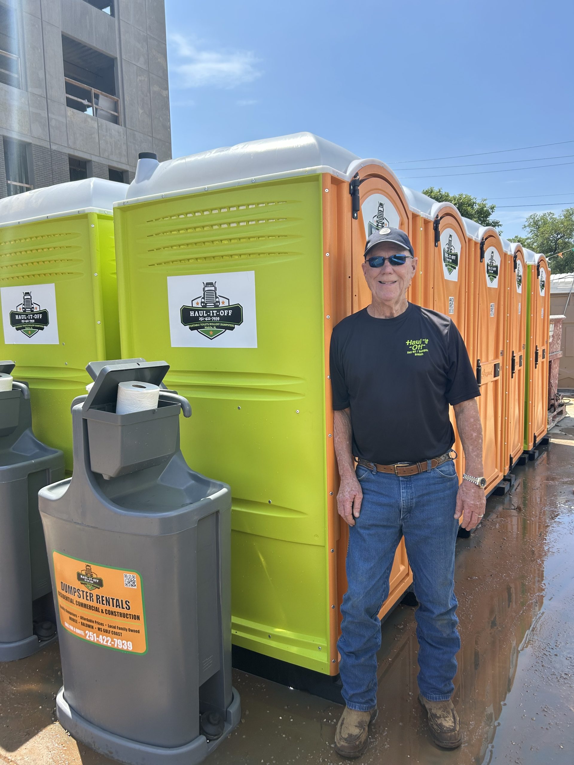 Customer by a Portable Toilet in Mobile AL